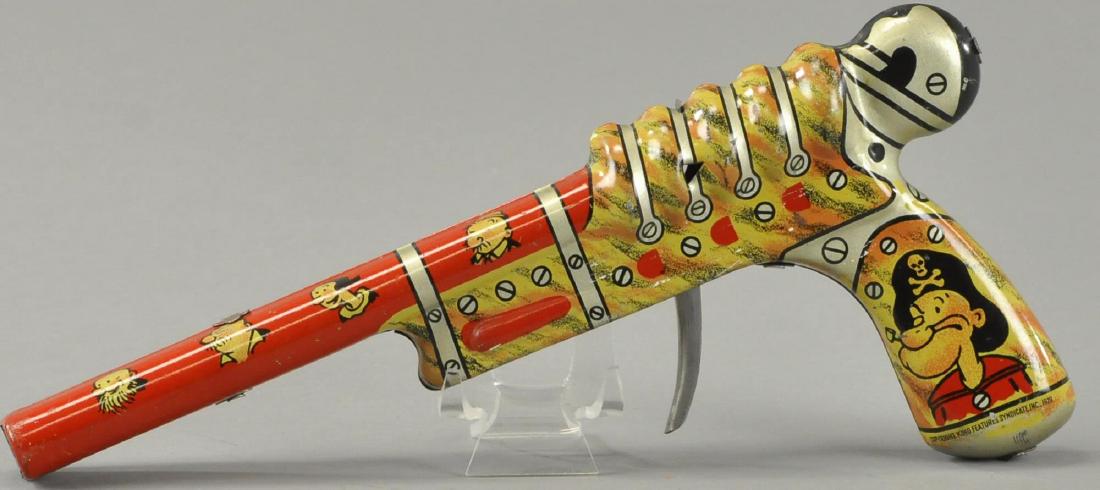 MARX POPEYE PIRATE PISTOL: Very colorful and detailed lithograph tin pop pistol done in shades of red and yellow, images appear at handle. 10" l.