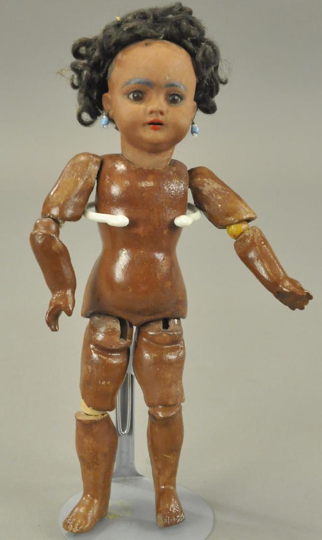 PETITE BLACK BISQUE HEAD DOLL: Very nice doll with head incised "S&H 739 DEP," with fired- in color, original glass stationary eyes, pierced earlobes, original curly black wig, open mouth with teeth on original jointed body with st