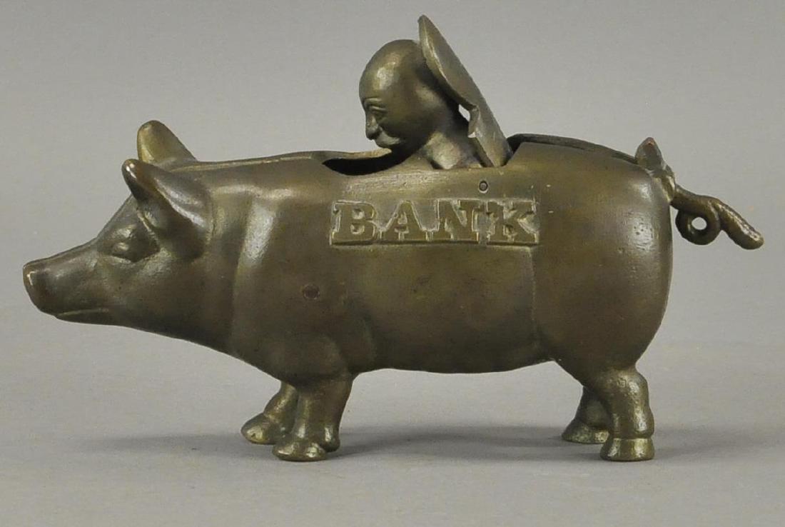 BRASS PIG MECHANICAL BANK WITH FIGURE (1 of 4)