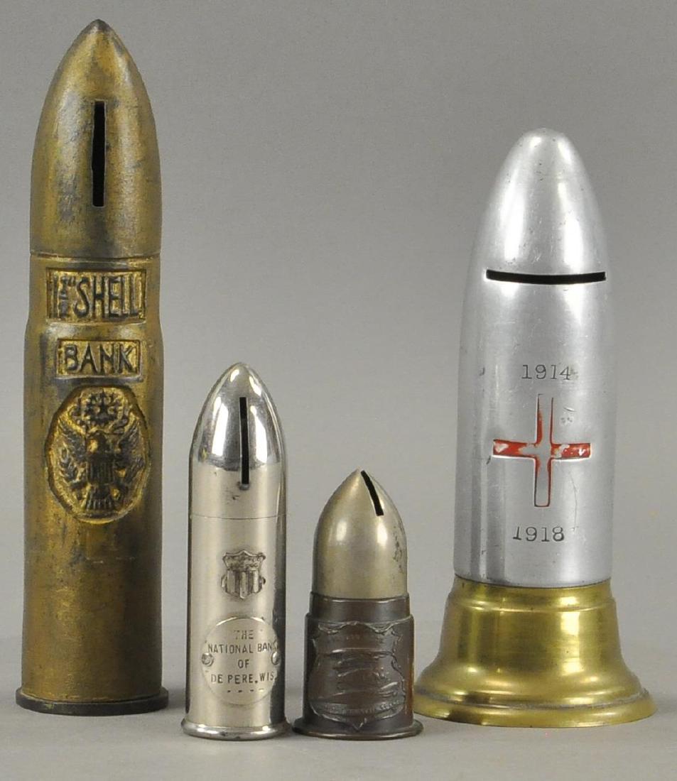 FOUR ARITLLERY SHELL STILL BANKS (1 of 2)