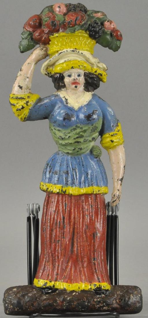 TROPICAL WOMAN HOLDING FRUIT BASKET WALL ORNAMENT (1 of 2)