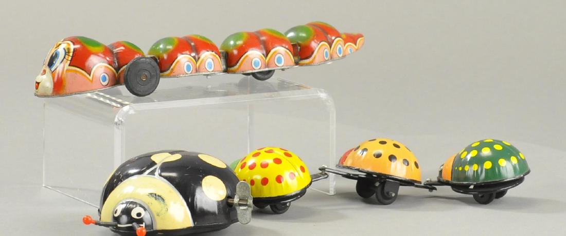 TWO JAPANESE TIN WIND UP BUGS (1 of 2)