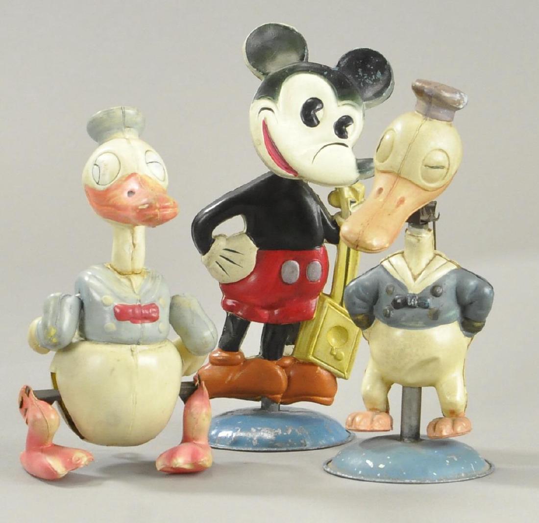 THREE DISNEY CELLULOID TOYS - RUBBERBAND NODDERS (1 of 3)
