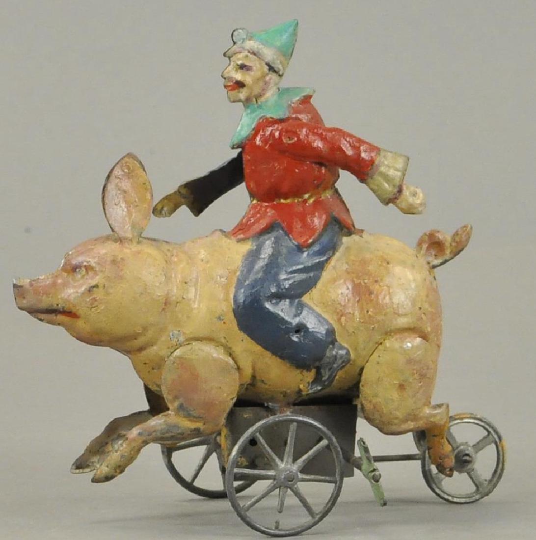 CLOWN RIDING PIG GERMAN HAND PAINTED TIN (1 of 4)