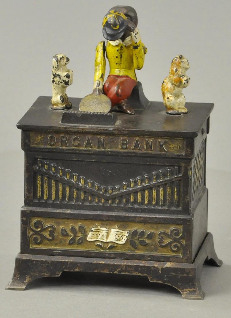 ORGAN BANK MECHANICAL BANK - CAT/DOG: 466. Bertoia BASICS Online: ORGAN BANK MECHANICAL BANK - CAT/DOG Lever broken, missing trap.