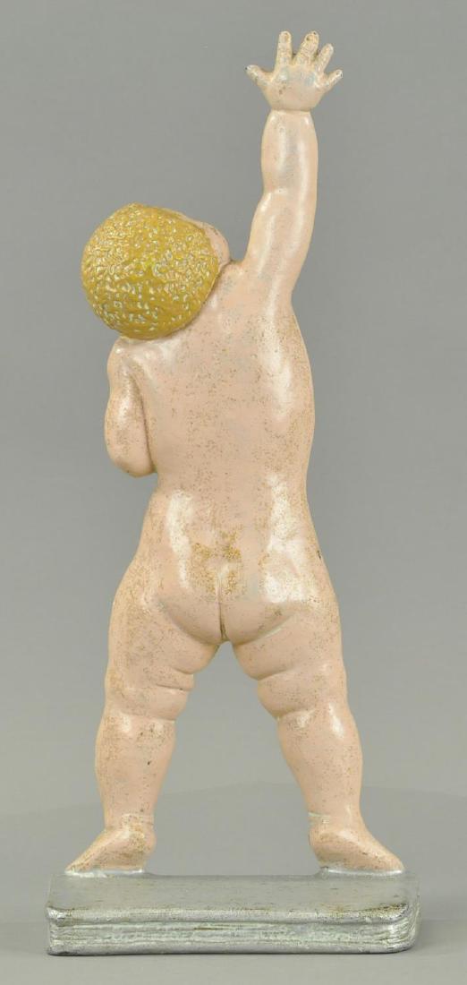 CHILD REACHING DOORSTOP (1 of 2)