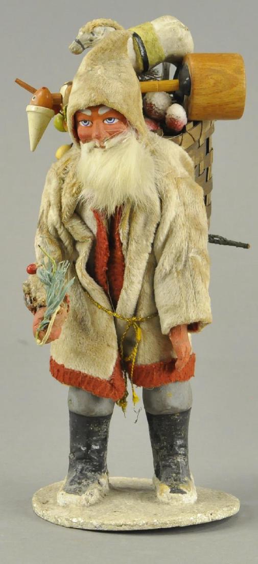 INTERESTING SANTA CLAUS FIGURE (1 of 4)