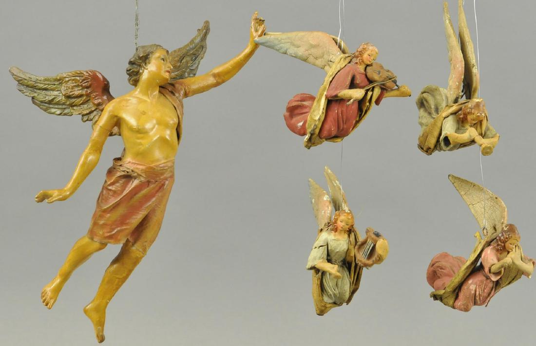 FIVE NEOPOLITAN ANGELS: These angels of good tidings are constructed of gessoed wood and composition, they are playing violin, harps and trumpets, all show great detail and good strong colors, one missing wing. 5" - 11" h.