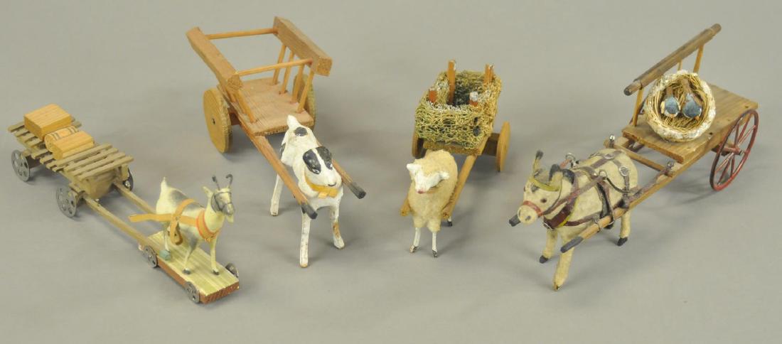 FOUR ANIMAL PULLED CARTS (1 of 3)