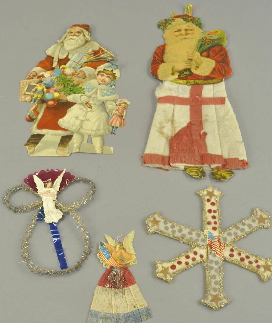 FIVE DIE-CUT CHRISTMAS DECORATIONS: Two Santas, an Angel, a patriotic angel, and a patriotic star. 9" - 17" l.