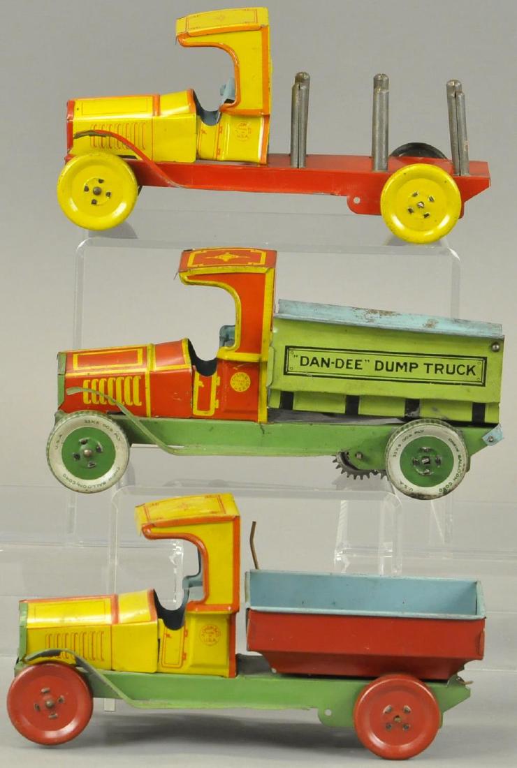 THREE CHEIN CONSTRUCTION TRUCKS (1 of 4)