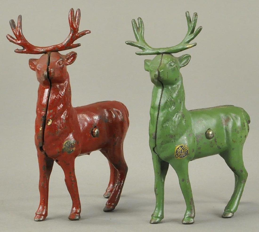 PAIR OF PAINTED REINDEER STILL BANKS (1 of 3)