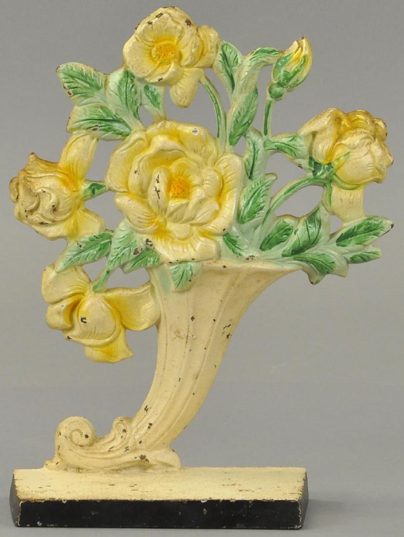 HUBLEY ROSES IN SLANTED VASE DOORSTOP (1 of 2)