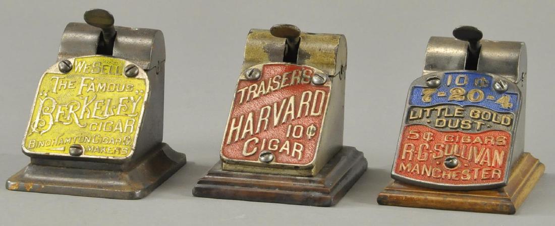 THREE ADVERTISING CIGAR CUTTERS (1 of 2)