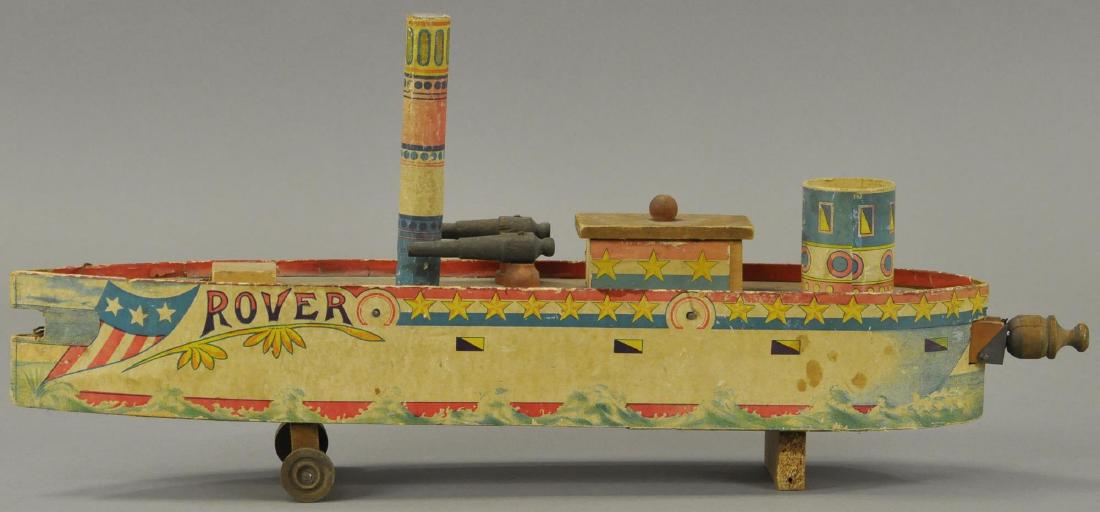 PAPER ON WOOD ROVER TORPEDO BOAT: 391 PAPER ON WOOD ROVER TORPEDO BOAT Missing front turret & centrally located mast, otherwise All Original Condition.