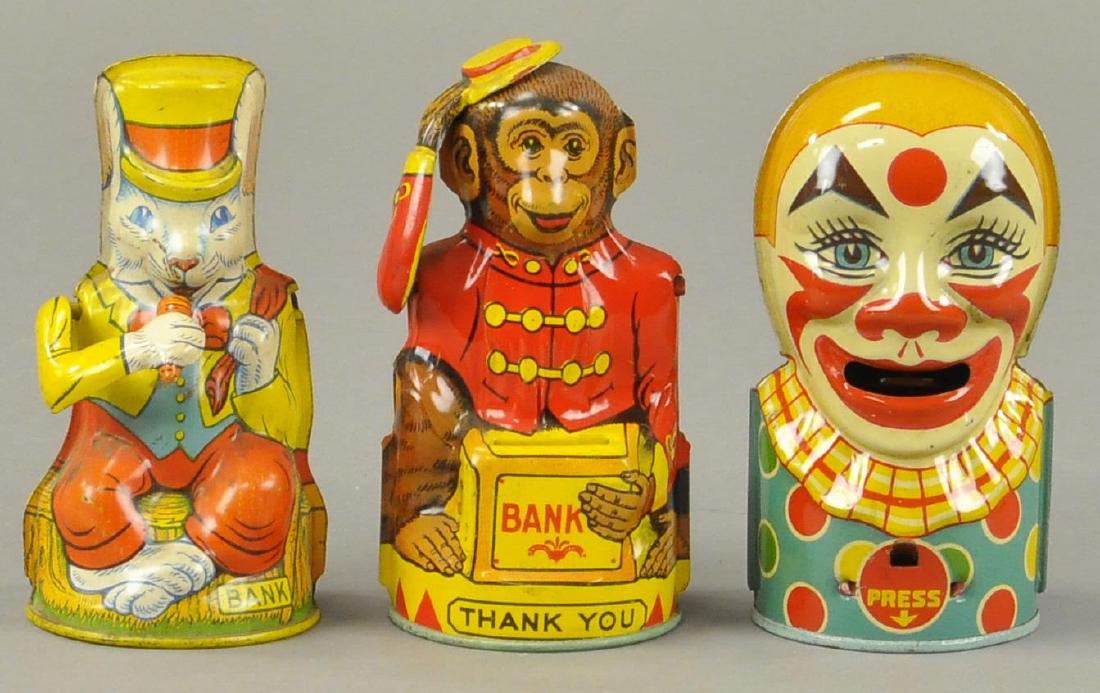 THREE CHEIN TIN BANKS - EARLY BUNNY (1 of 3)