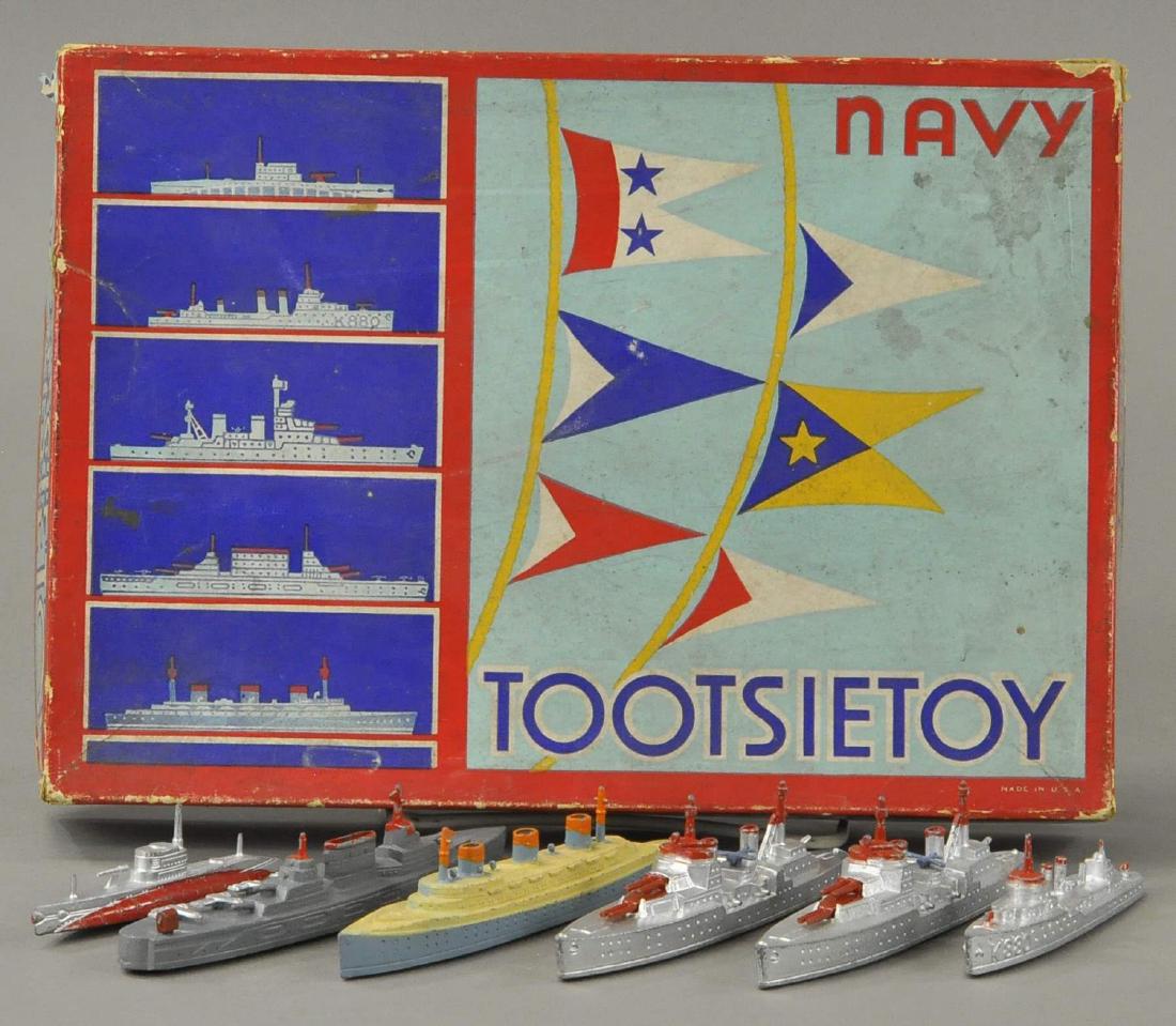 BOXED TOOTSIETOY FLOATING NAVY: 453 BOXED TOOTSIETOY FLOATING NAVY 11.5" w. Airplanes on carrier boat have minor damages, otherwise All Original Condition.