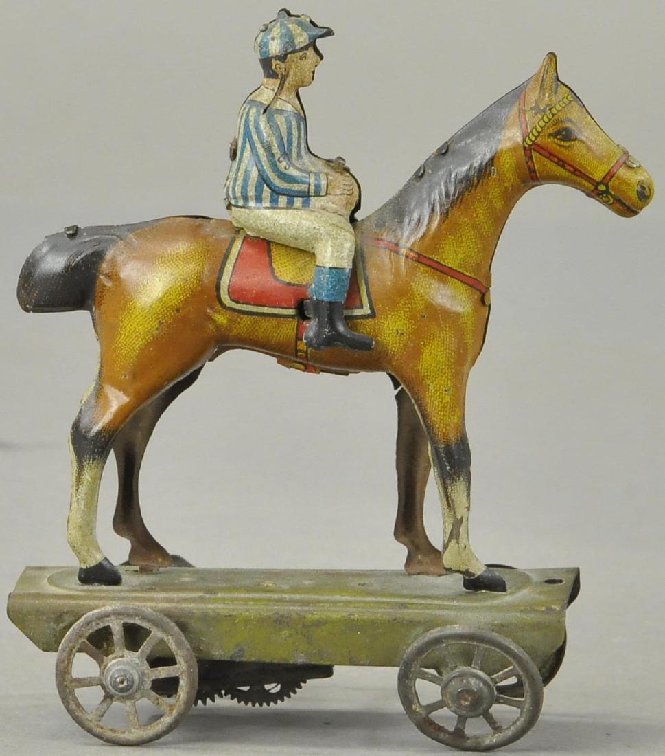 JOCKEY ON HORSE WIND UP TOY: 130. JOCKEY ON HORSE WIND UP TOY | All Original Condition. | 5"