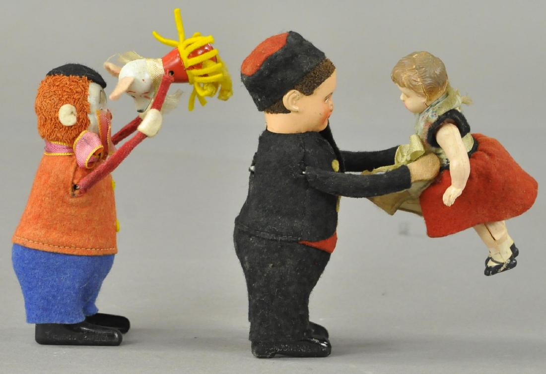 TWO SCHUCO LIFTING FIGURES (1 of 3)