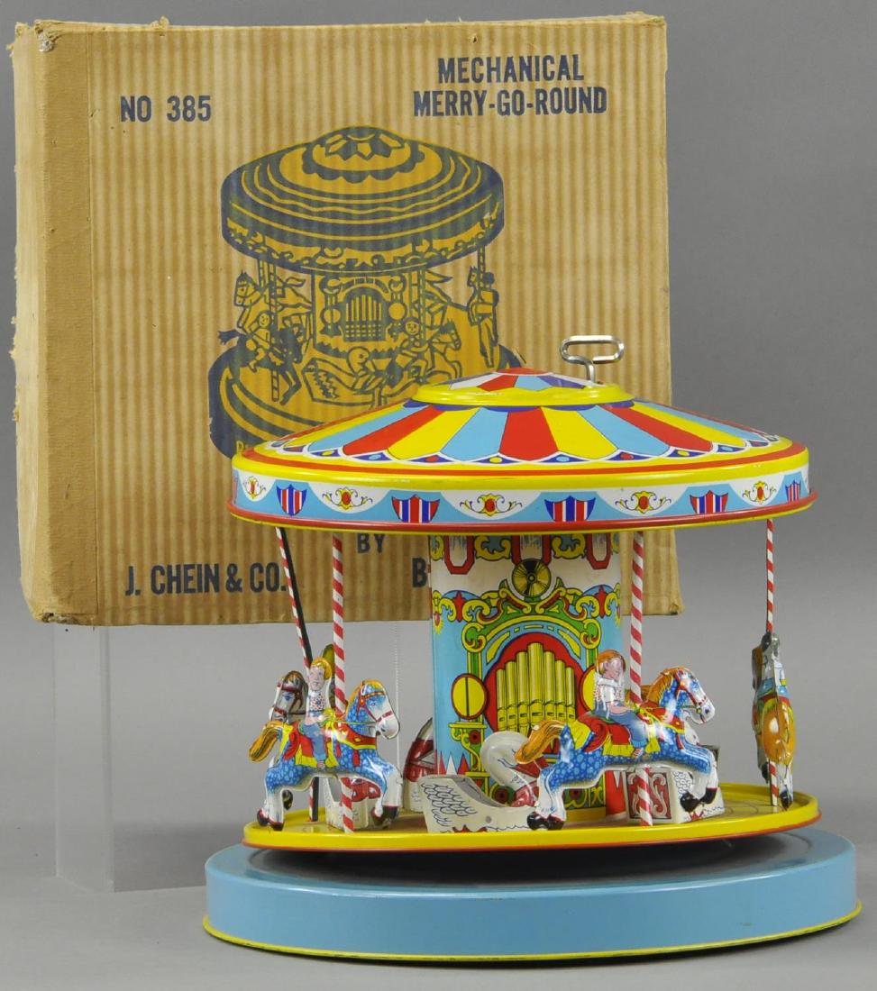 BOXED CHEIN MERRY GO ROUND (1 of 2)