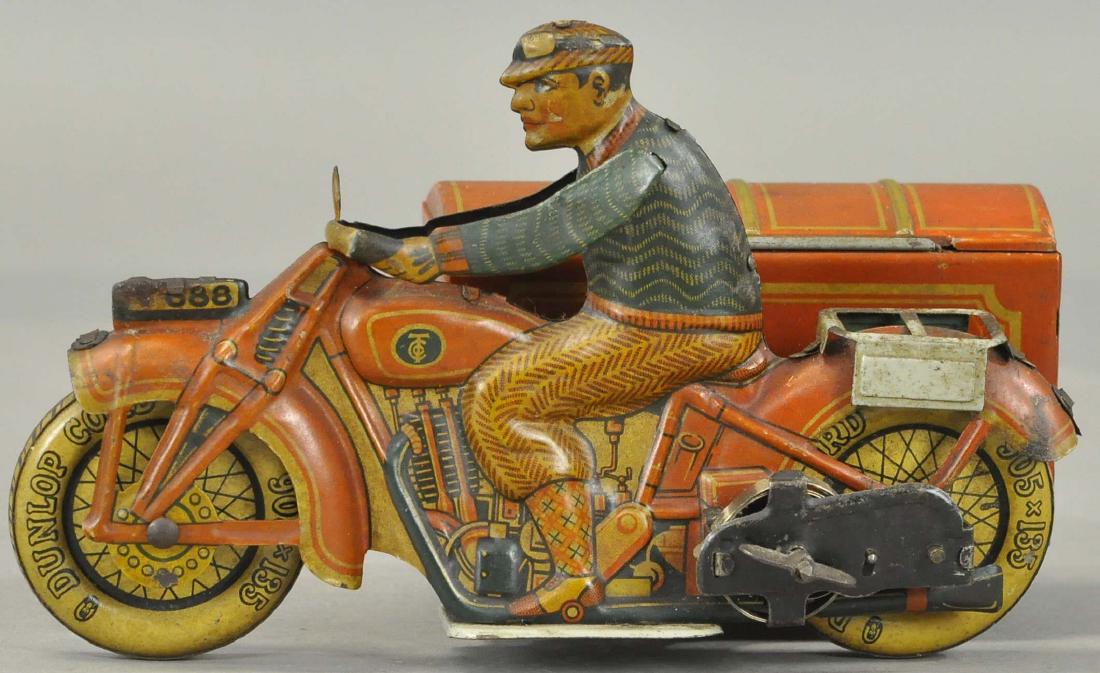 TIPPCO MOTORCYCLE W/DELIVERY CART: 53. TIPPCO MOTORCYCLE W/DELIVERY CART | Germany, familiar style lithograph cycle with delivery bin sidecar, some cleaning and brightening should improve the condition by a full grading. 8" l.