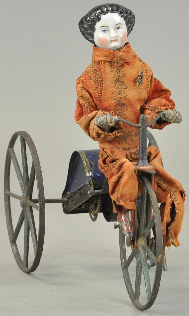 CHINA HEAD GIRL ON VELOCIPEDE (1 of 4)