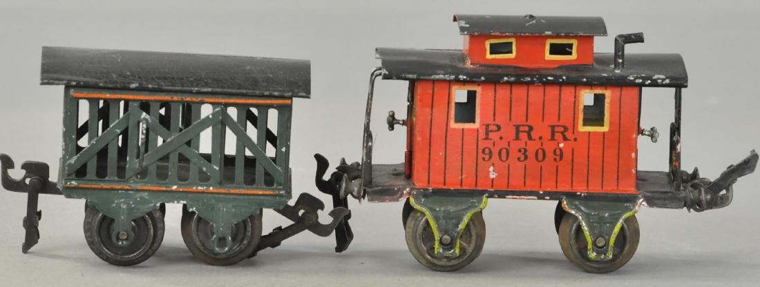 MARKLIN O GAUGE CABOOSE AND CATTLE CAR. (1 of 4)