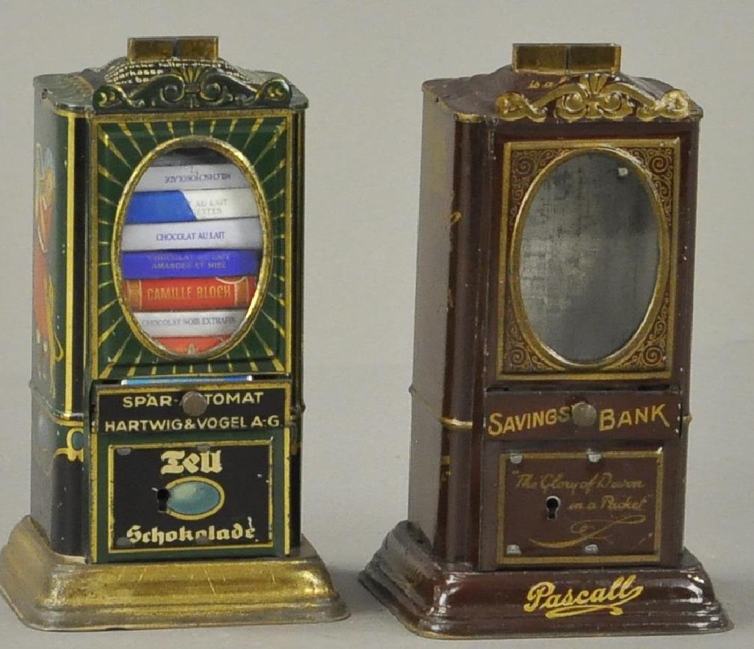 PAIR OF TIN CHOCOLATE DISPENSING BANKS (1 of 4)