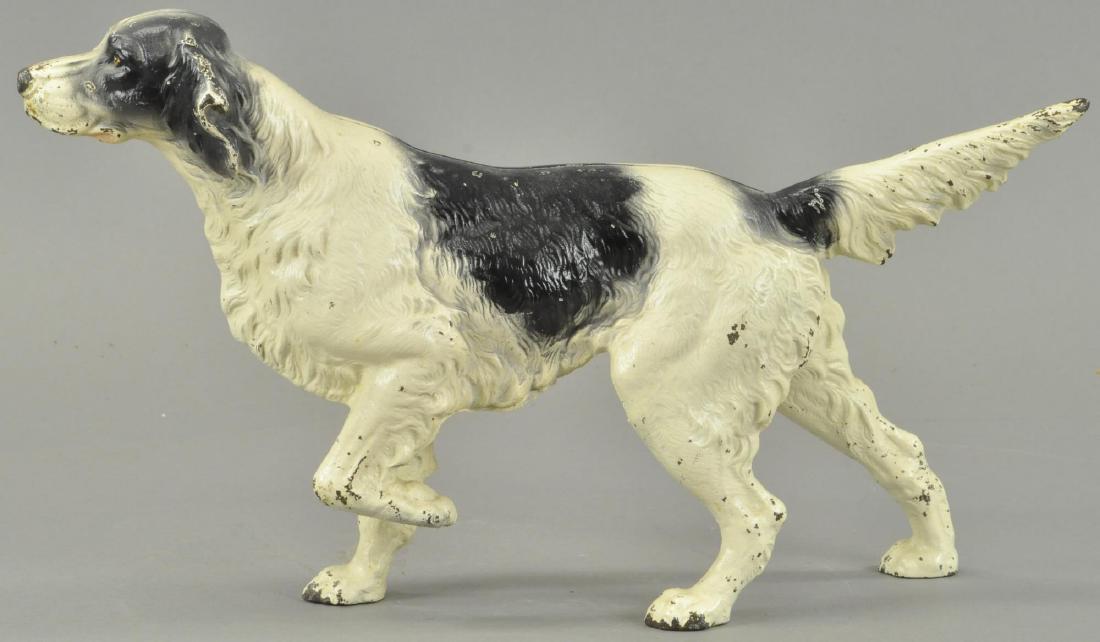 HUBLEY ENGLISH SETTER DOORSTOP: 1114. HUBLEY ENGLISH SETTER DOORSTOP | Full figure, black and white setter pointed and ready for the hunt, beautiful detailed casting. 8.875" x 15.5".