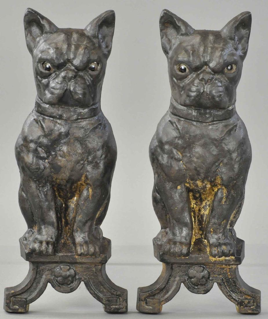 BOSTON TERRIER FIREPLACE ANDIRONS: 1126. BOSTON TERRIER FIREPLACE ANDIRONS | circa 1905, unusual glass eyes cast iron figures of Boston Terriers guarding the fireplace mantel. 17" h.