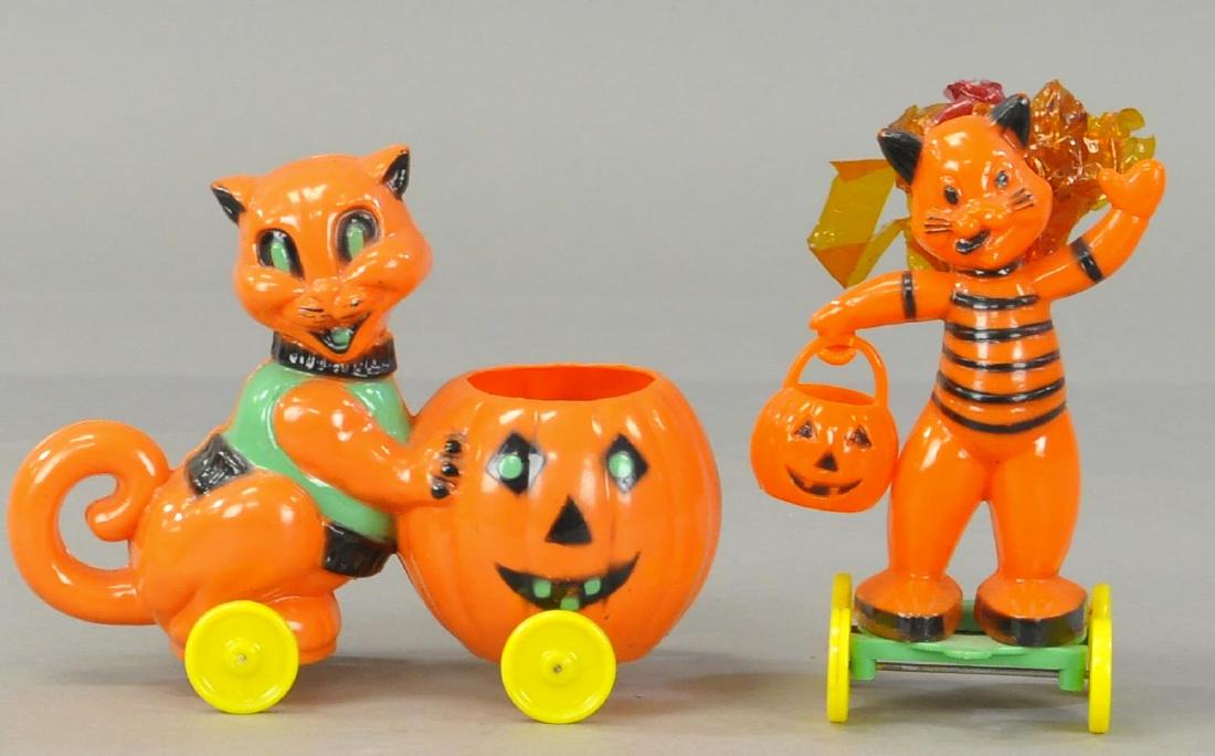 TWO PLASTIC CAT CANDY CONTAINERS (1 of 3)