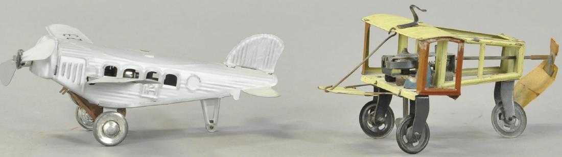 PAIR OF TIN AIRPLANES - PUSHER PLANE (1 of 2)