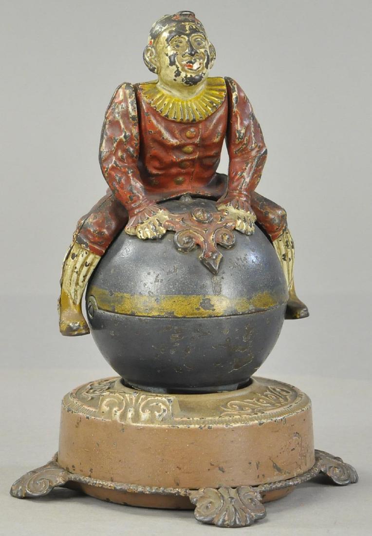 CLOWN ON GLOBE MECHANICAL BANK (1 of 4)