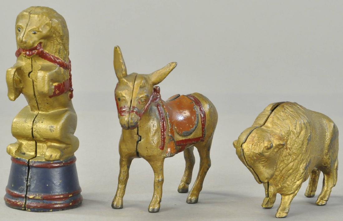 THREE GOLD PAINTED ANIMAL STILL BANKS (1 of 3)