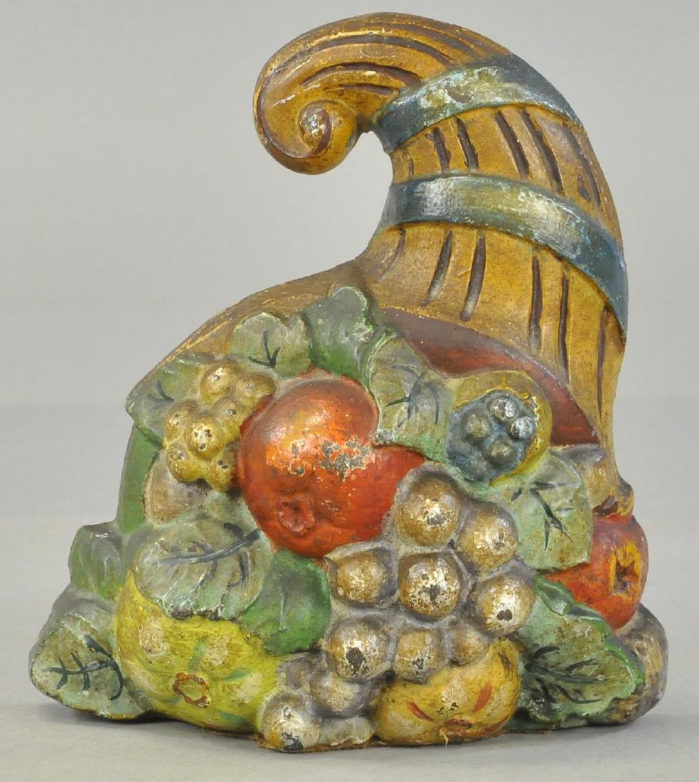 CORNUCOPIA OF FRUIT DOORSTOP: 1368. CORNUCOPIA OF FRUIT DOORSTOP | All Original Condition. | 8" h.