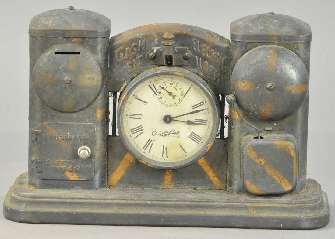 CLOCK FACE AND ELECTRIC ALARM STILL BANK: 1425. CLOCK FACE AND ELECTRIC ALARM STILL BANK | All Original Condition. | 13" l.