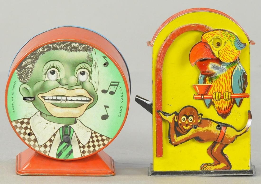 TWO TIN MECHANICAL BANKS (1 of 3)