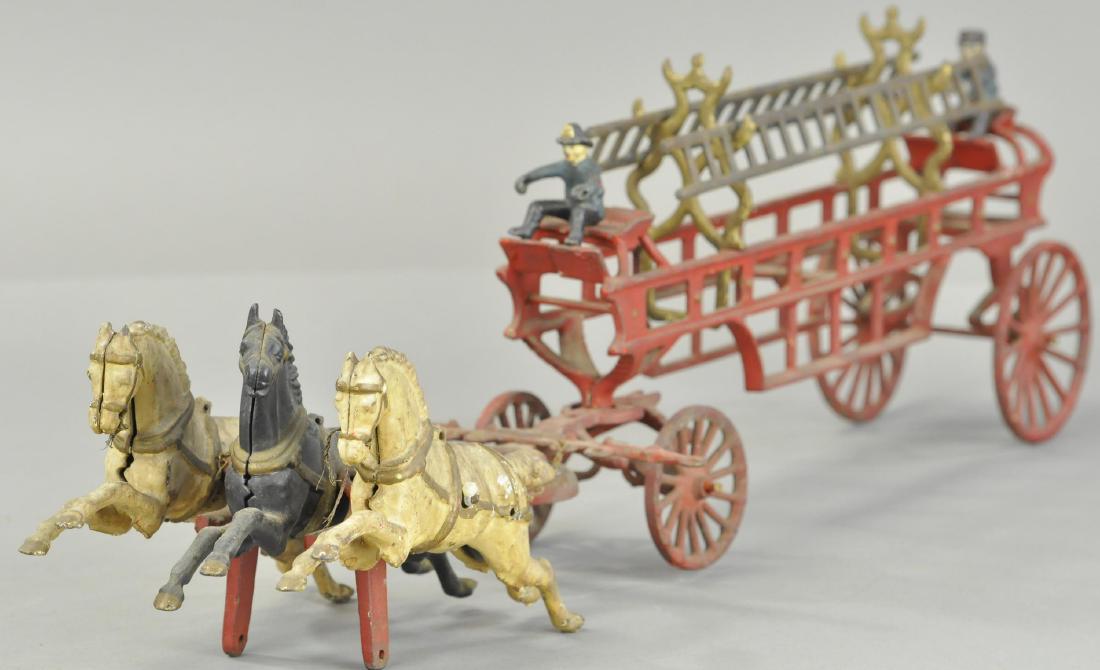HORSE DRAWN HOOK AND LADDER WAGON: 1608. HORSE DRAWN HOOK AND LADDER WAGON | Horses missing lead wheels, figures mix-matched, paint in All Original Condition. | 27.5" l.