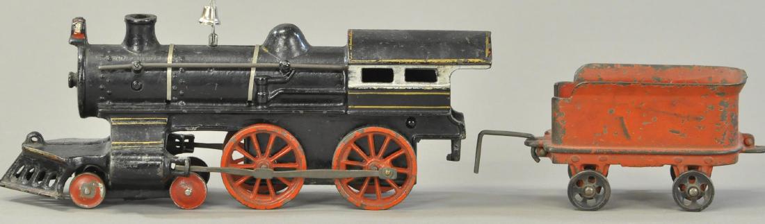 IVES NO. 40 4-4-0 FLOOR LOCOMOTIVE & TENDER: 325. IVES NO. 40 4-4-0 FLOOR LOCOMOTIVE & TENDER | Tender added, belly on pilot wheel replaced, bell is replaced, otherwise All Original Condition. | O gauge. Loco & tender 17" l.