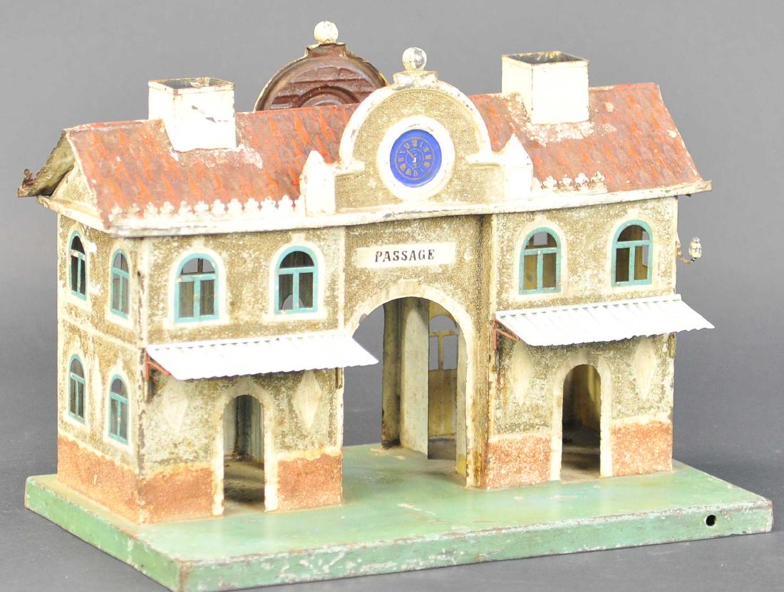 MARKLIN PASSENGER STATION: 65. MARKLIN PASSENGER STATION | Germany, 1 gauge Marklin station for the English market, textured walls to resemble stucco, embossed hand painted roof with two chimneys, two awnings above doorways, fe