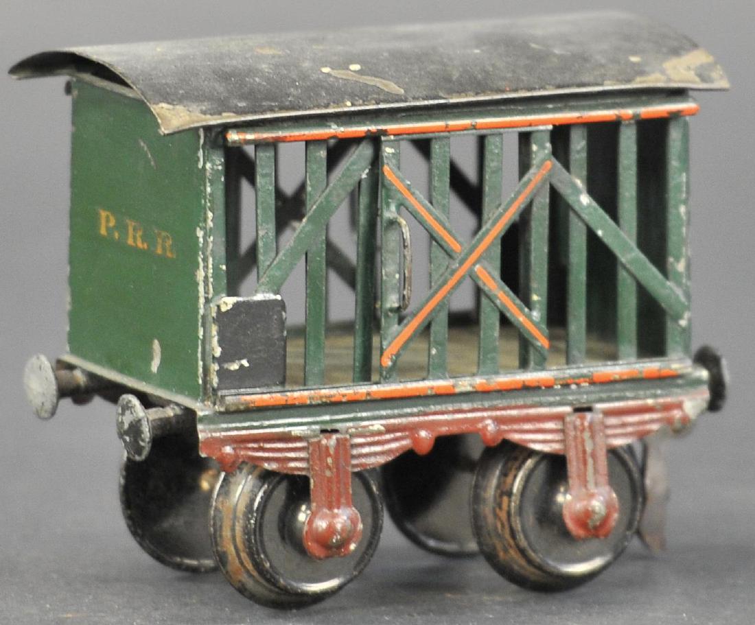 RARE MARKLIN PRR CATTLE CAR: 124. RARE MARKLIN PRR CATTLE CAR | Germany, 1 gauge, Marklin cattle car marked "P.R.R." in gold lettering on each end for the American market, sliding doors on each side, orange pin striping 5" l.