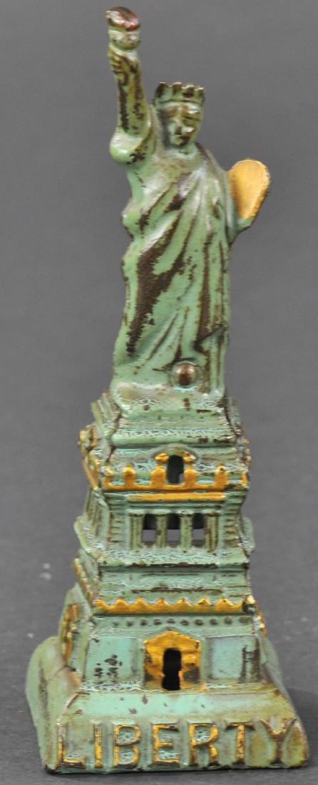 PAINTED STATUE OF LIBERTY STILL BANK: 457. PAINTED STATUE OF LIBERTY STILL BANK | Kenton, US. 6.5"