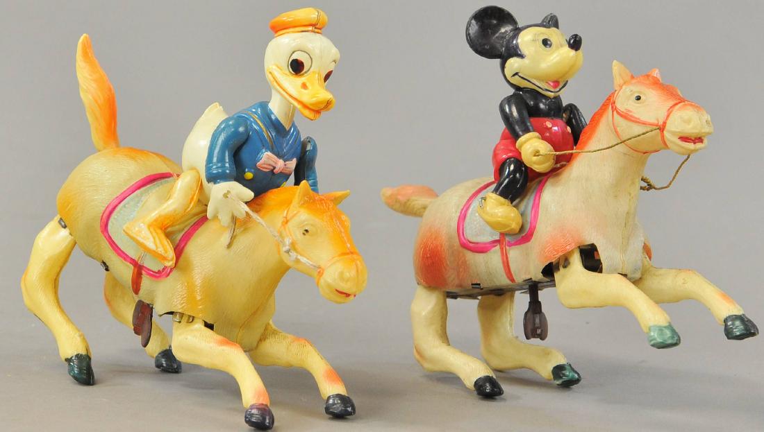 DONALD & MICKEY RIDING JUMPING HORSES (1 of 3)