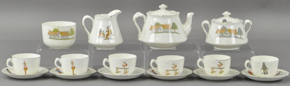 PALMER COX BROWNIE TEA SET: 113. PALMER COX BROWNIE TEA SET | Six cups and saucers, teapot, sugar bowl, creamer and a finger bowl. 2 1/2"-5"
