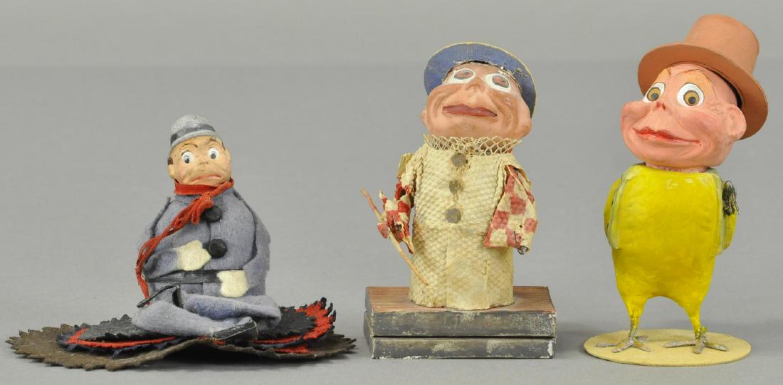 THREE PALMER COX FIGURES (1 of 4)