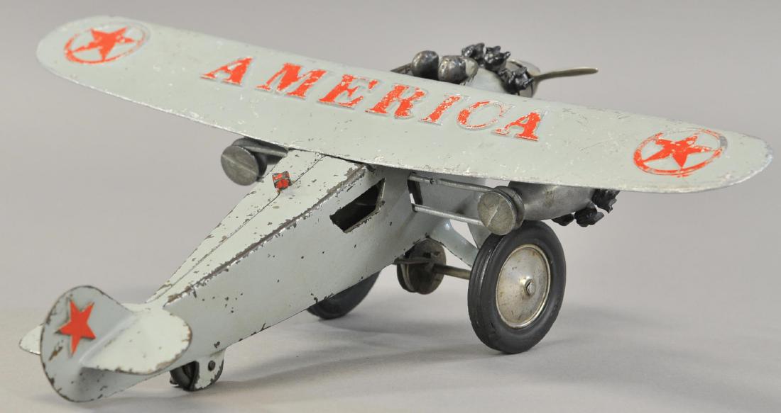 HUBLEY AMERICA TRIMOTOR AIRPLANE: 174. HUBLEY AMERICA TRIMOTOR AIRPLANE | Large airplane with original removable pilot figures and two-tone painted aluminum wing. 17" wingspan