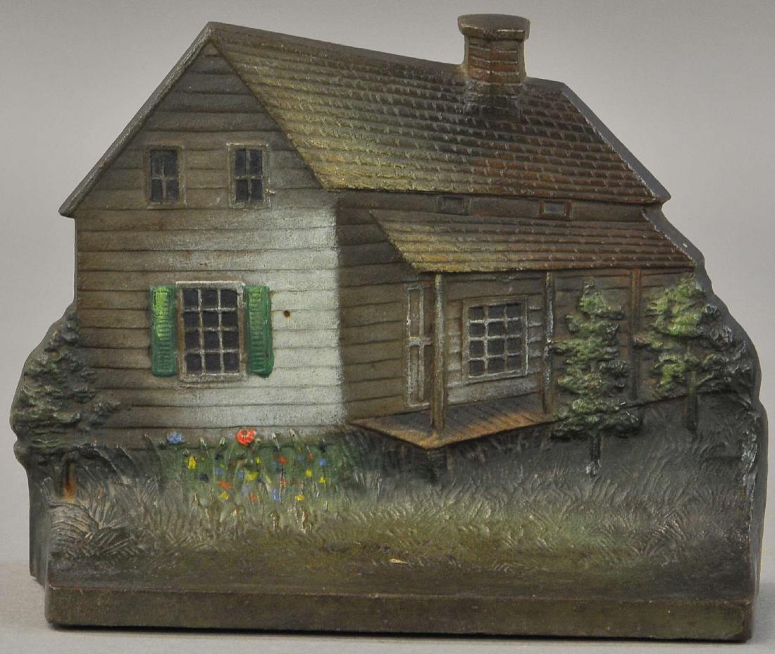 B&H EDGAR ALLEN POE CABIN: 303. B&H EDGAR ALLEN POE CABIN | Bradley & Hubbard, retains one rubber bumper, beautiful detailed casting. 5.75" x 7.75".
