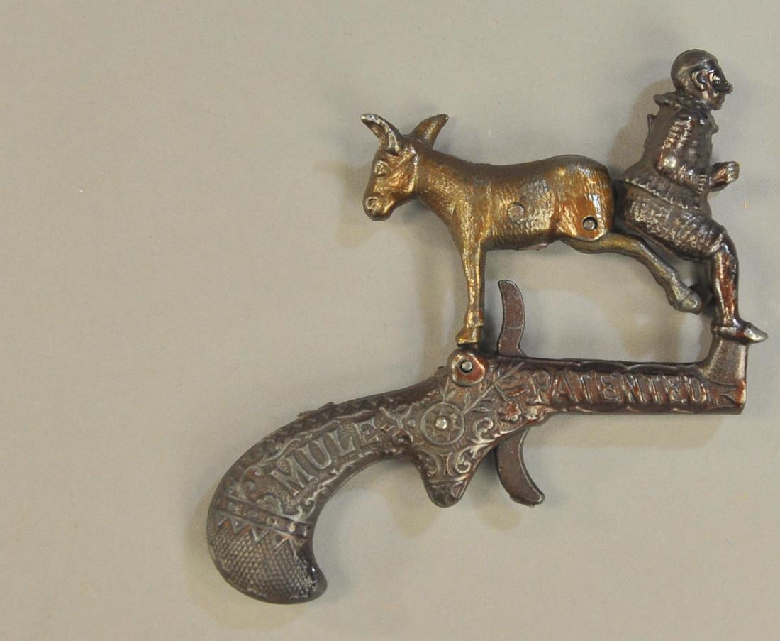 CLOWN AND MULE ANIMATED CAP PISTOL: 353. CLOWN AND MULE ANIMATED CAP PISTOL | 5.25" l.