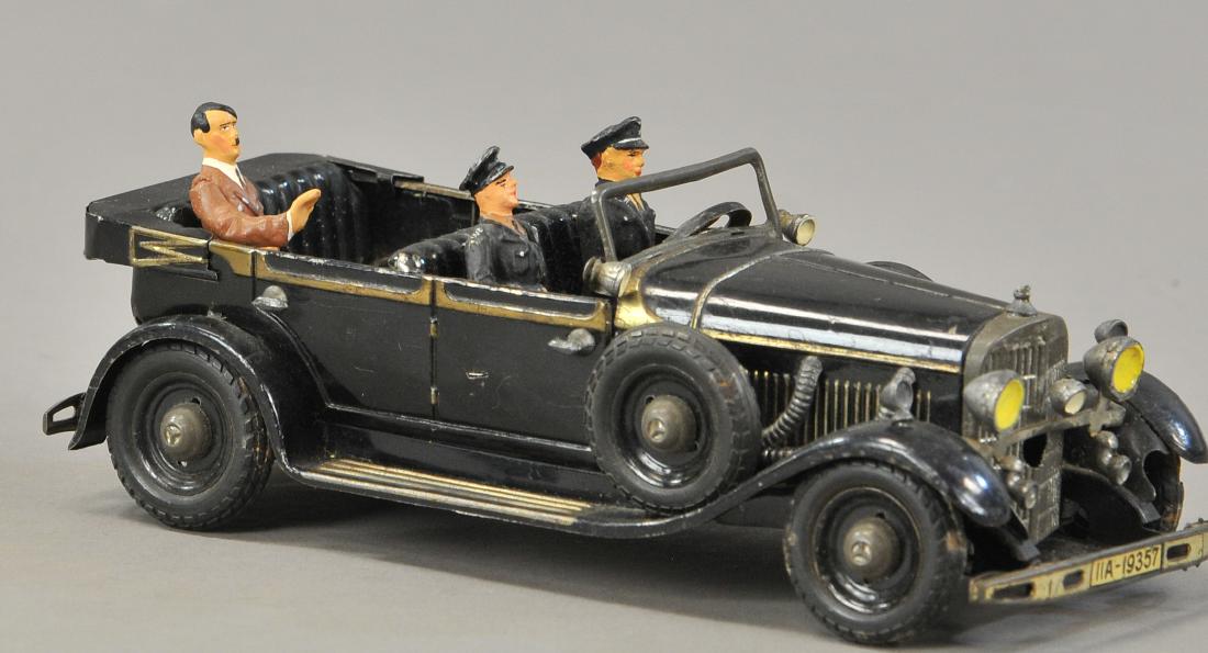 TIPPCO HITLER'S MERCEDES AUTO: 1104. TIPPCO HITLER'S MERCEDES AUTO | Black version, elaborate toy version of the Fuhrer's personal vehicle, comes with added figures (not original). 9" l.