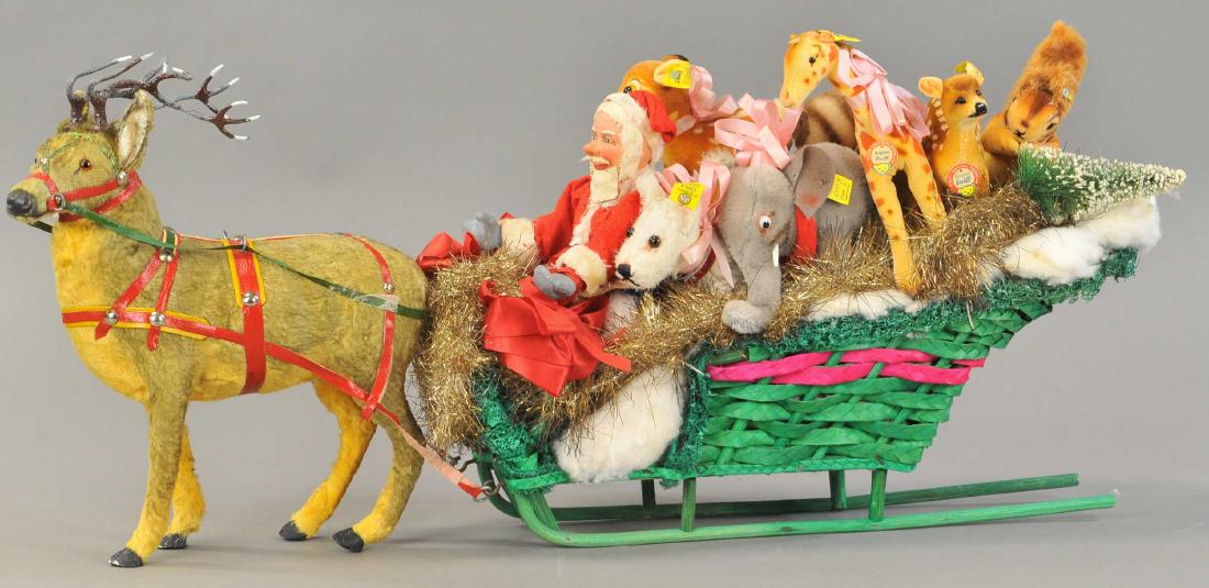 REINDEER PULLING SANTAS SLEIGH LOADED WITH STEIFF (1 of 3)